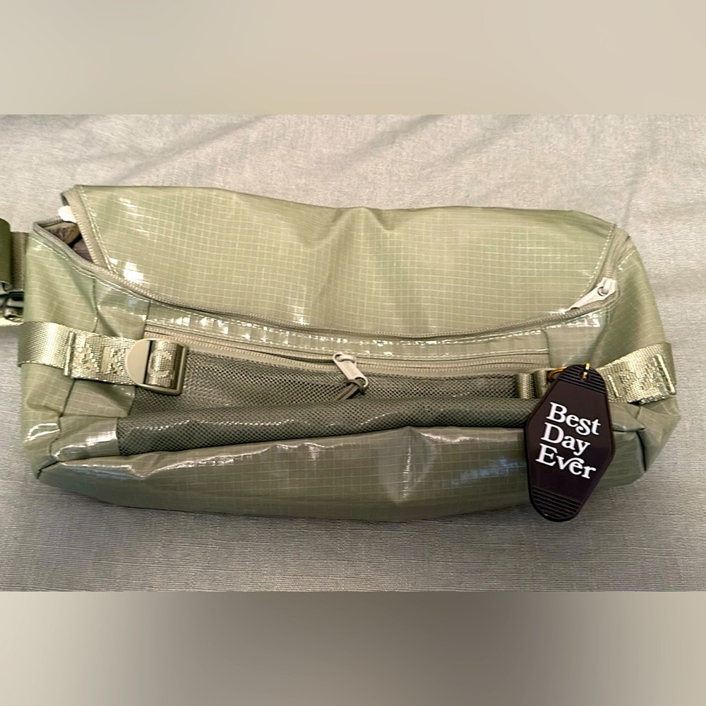 Brand New Calpak Terra Sling in Juniper.